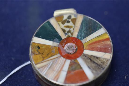 A 19th century continental silver gilt and multi hardstone segmented circular snuff box and cover, 7cm.